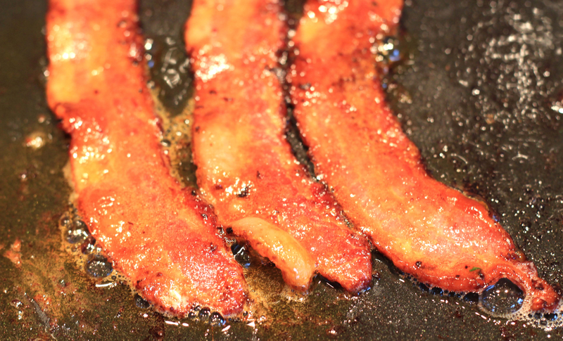 Illustration for article titled Give your Western breakfast a Korean twist with gochujang-fried bacon